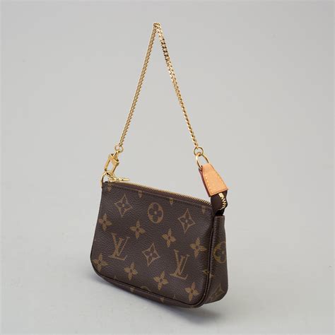 louis vuitton tiny bag|Louis Vuitton small round bag.